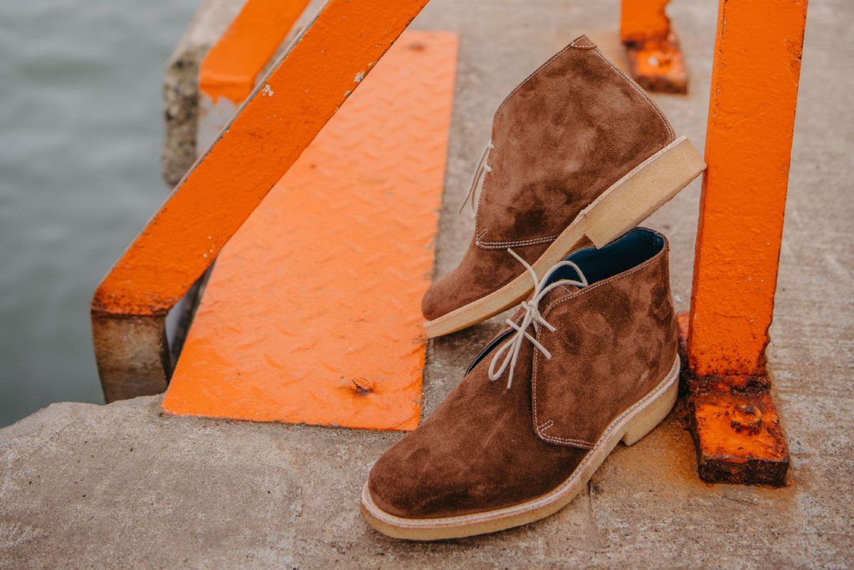 Brown suede chukka boots with crepe-style soles